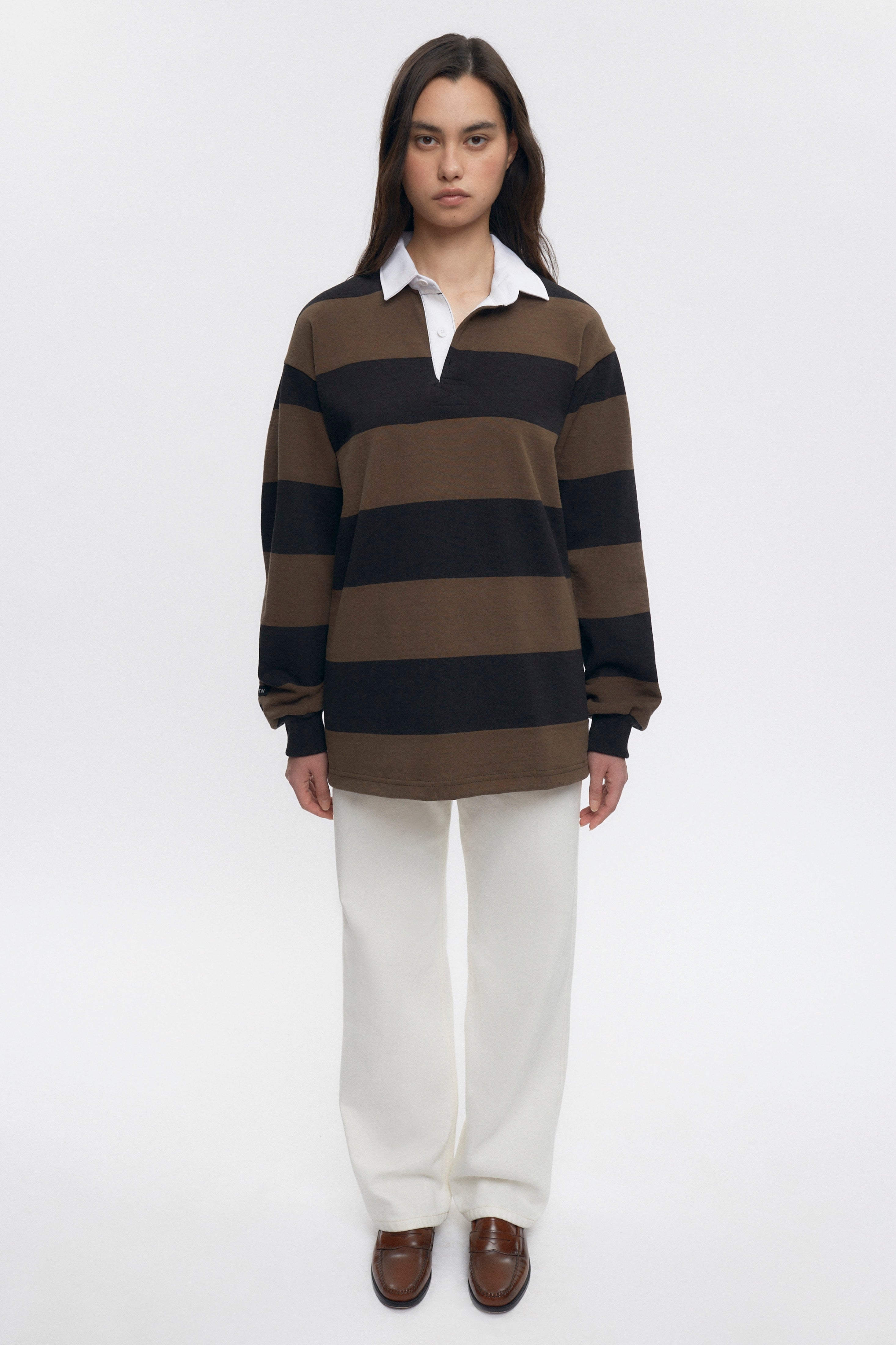 Michelle is 5’10” is a regular XS and is wearing a S.