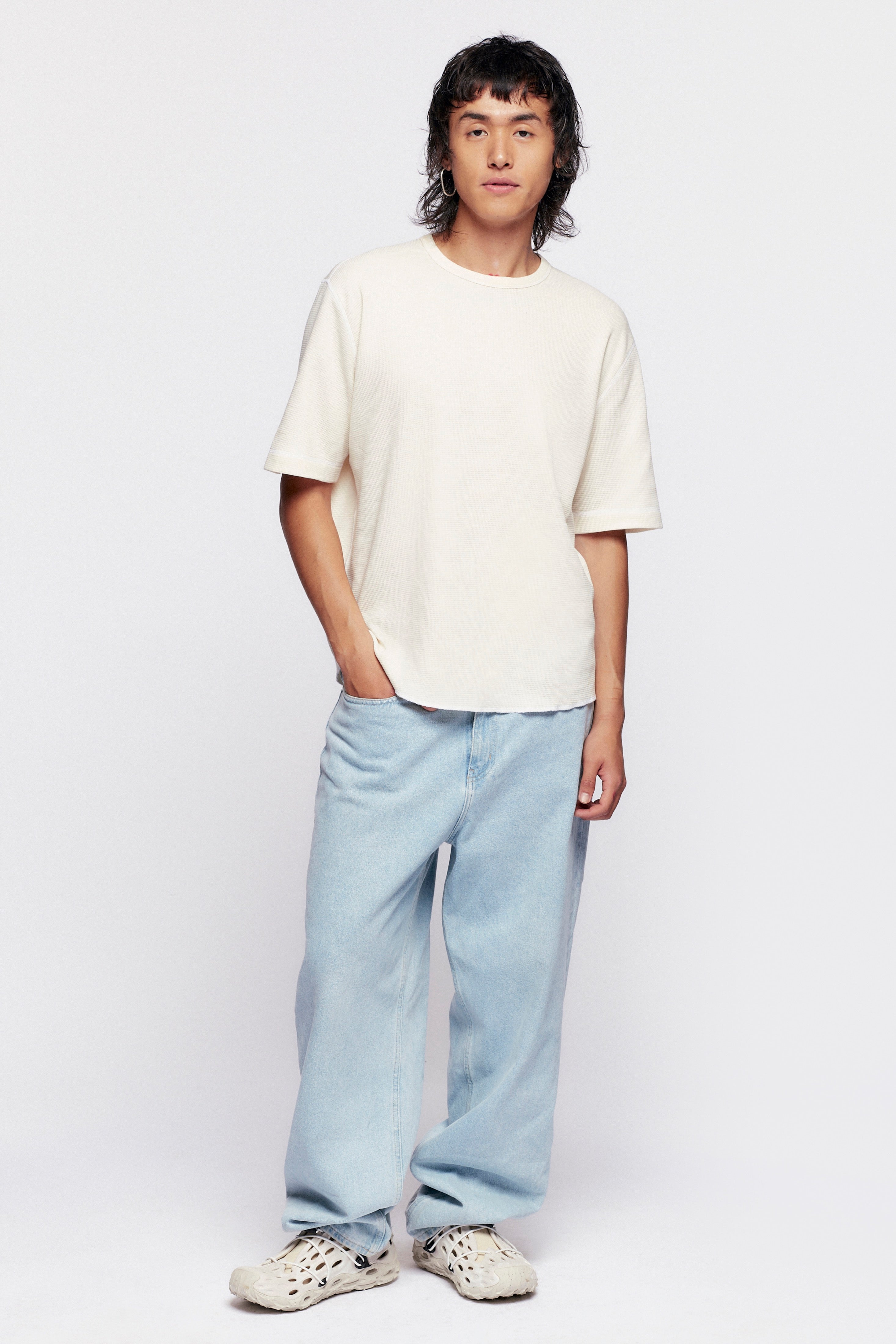 Tashi is 6'0, regular size M wearing a size M.