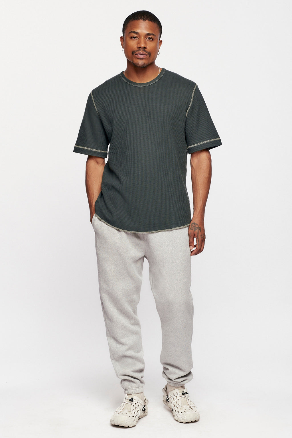 Jason is 6ft 1in, a regular size M and is wearing a M.