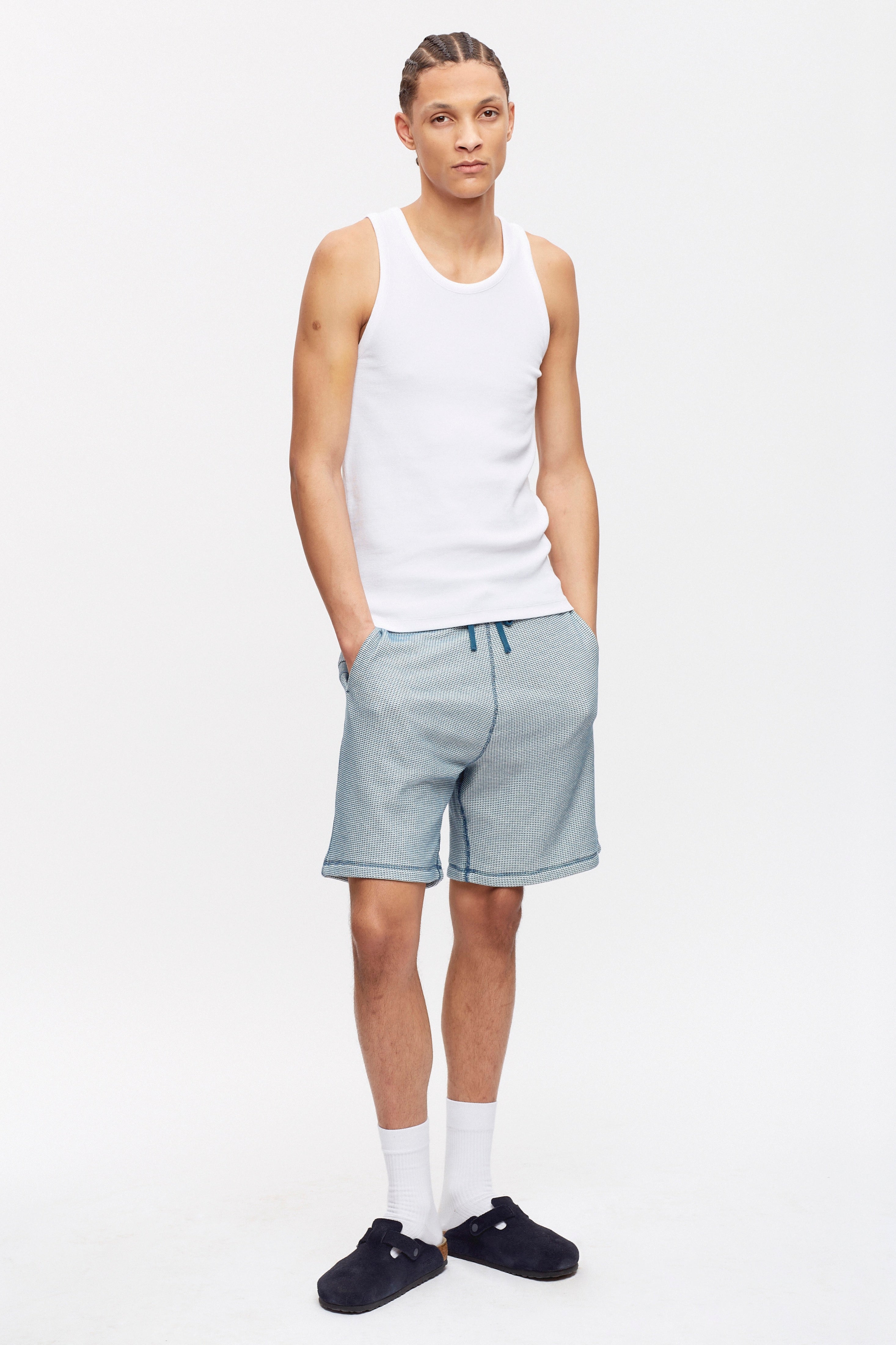 Ethan is 6ft 2in, a regular size M and is wearing a M.