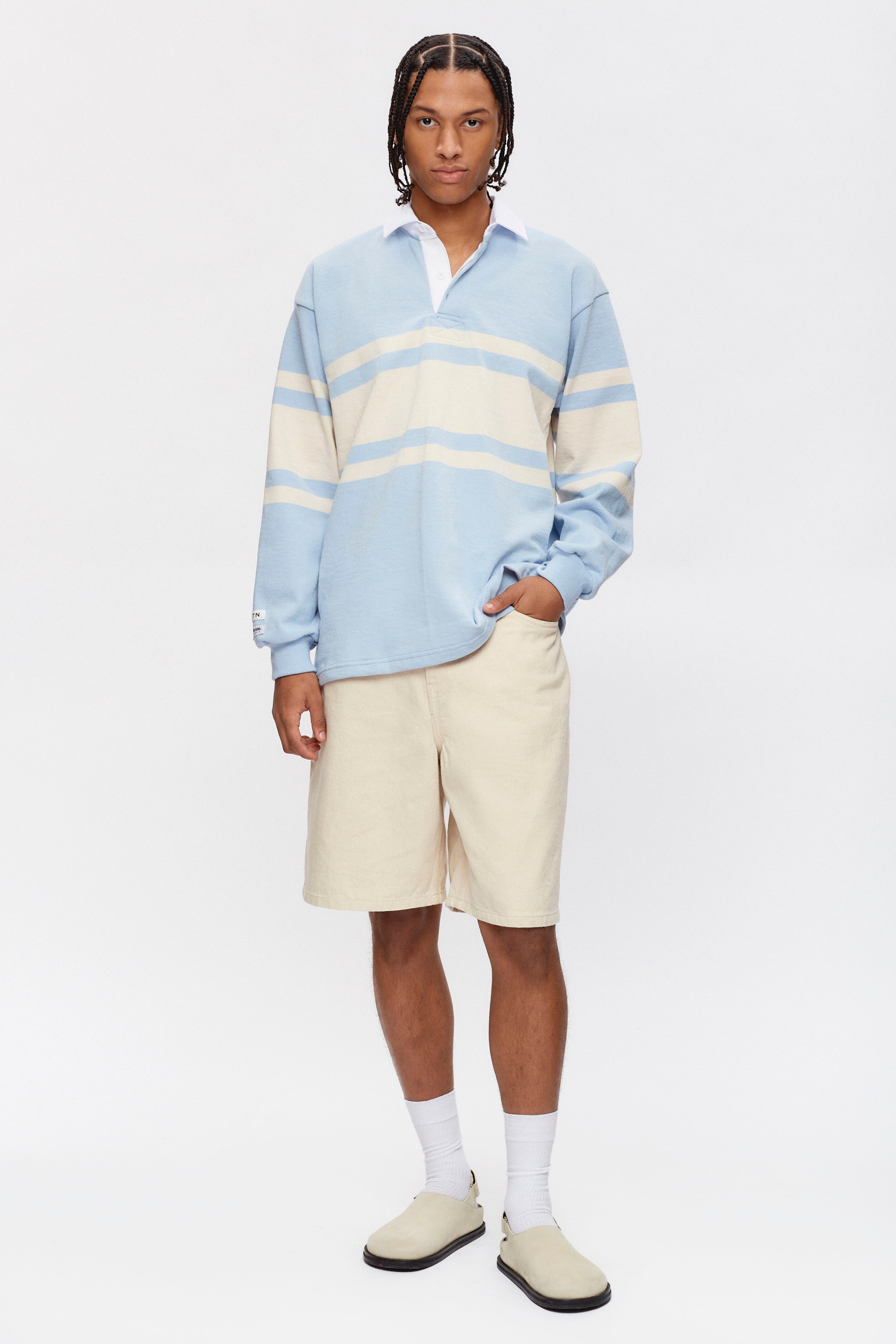 Ethan is 6ft 3in, a regular size M and wearing a M.