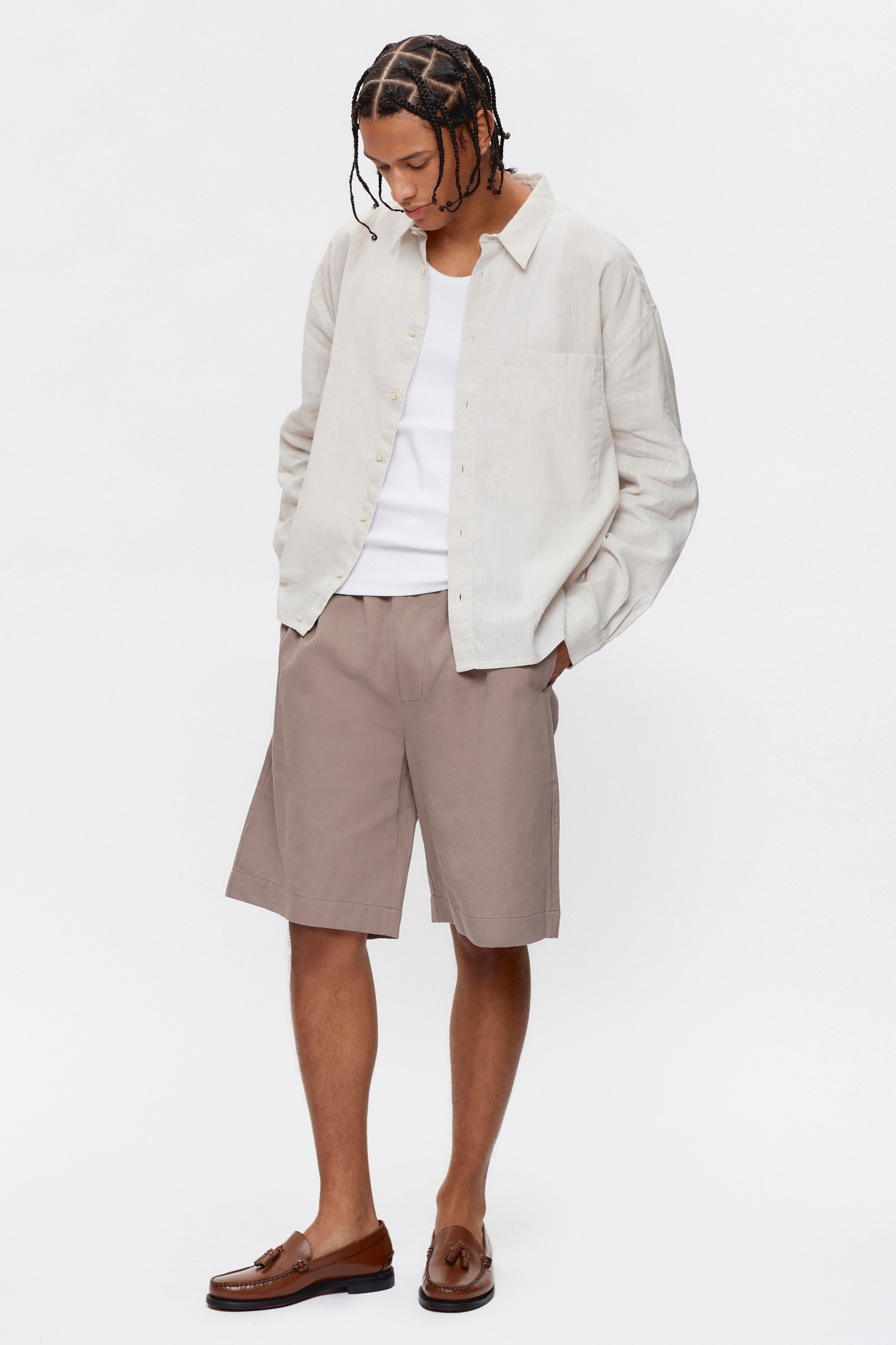 Ethan is 6ft 3in, a regular size M and wearing a M.