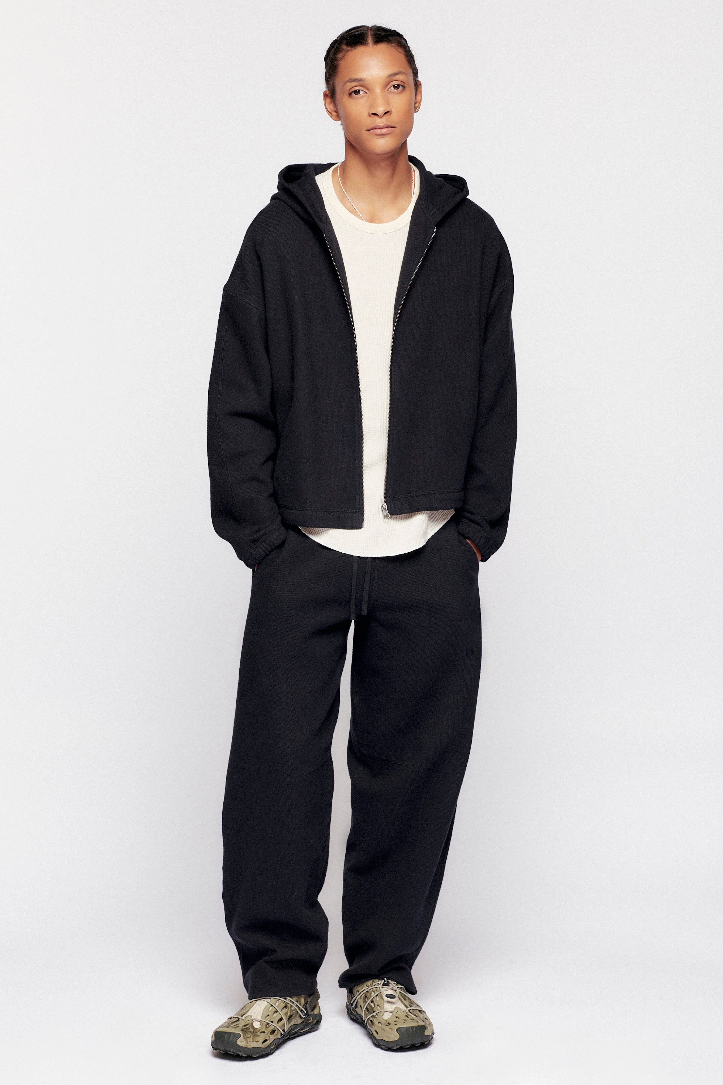 Ethan is 6ft 2in, a regular size S and is wearing a M.