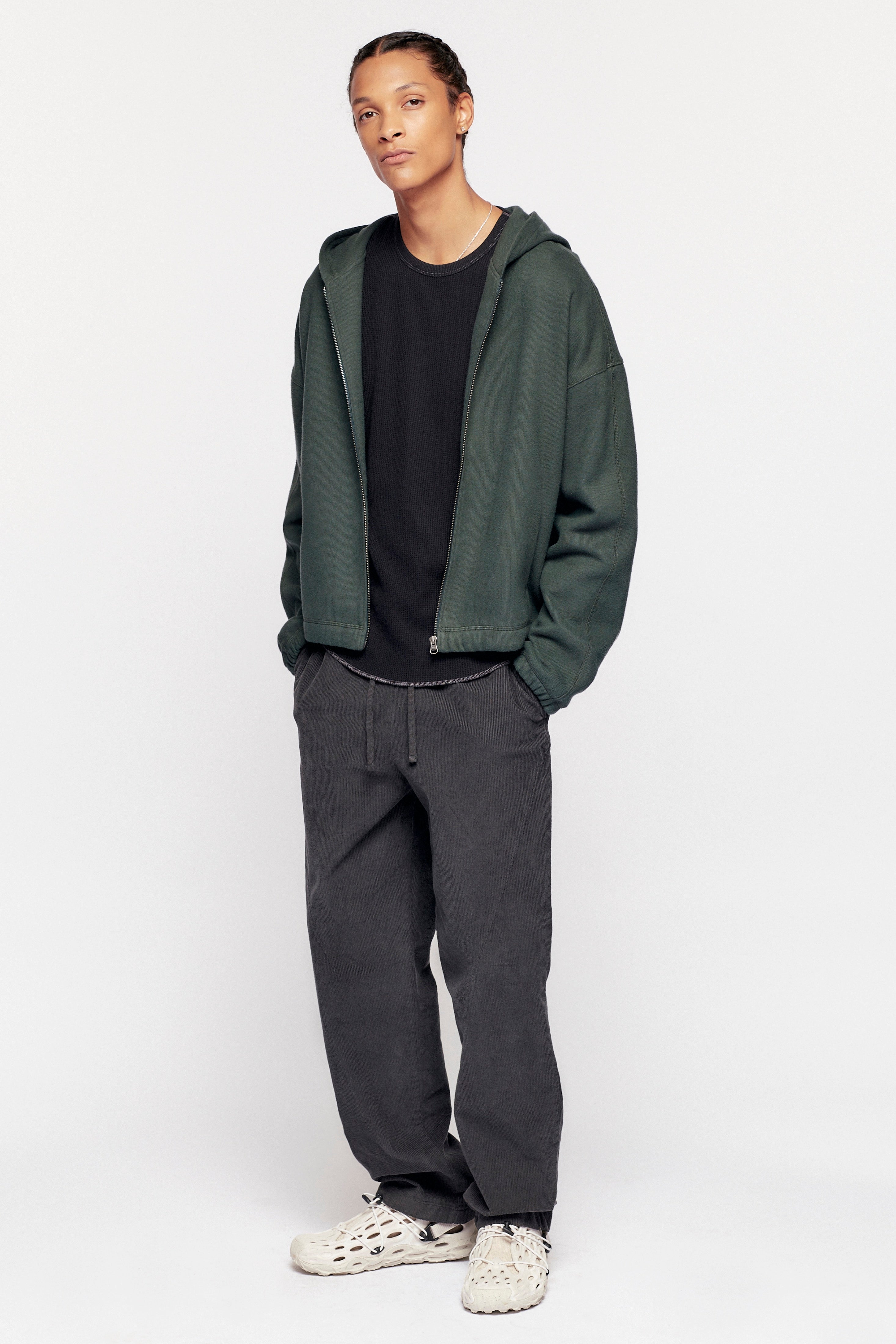 Ethan is 6ft 2in, a regular size S and is wearing a M.