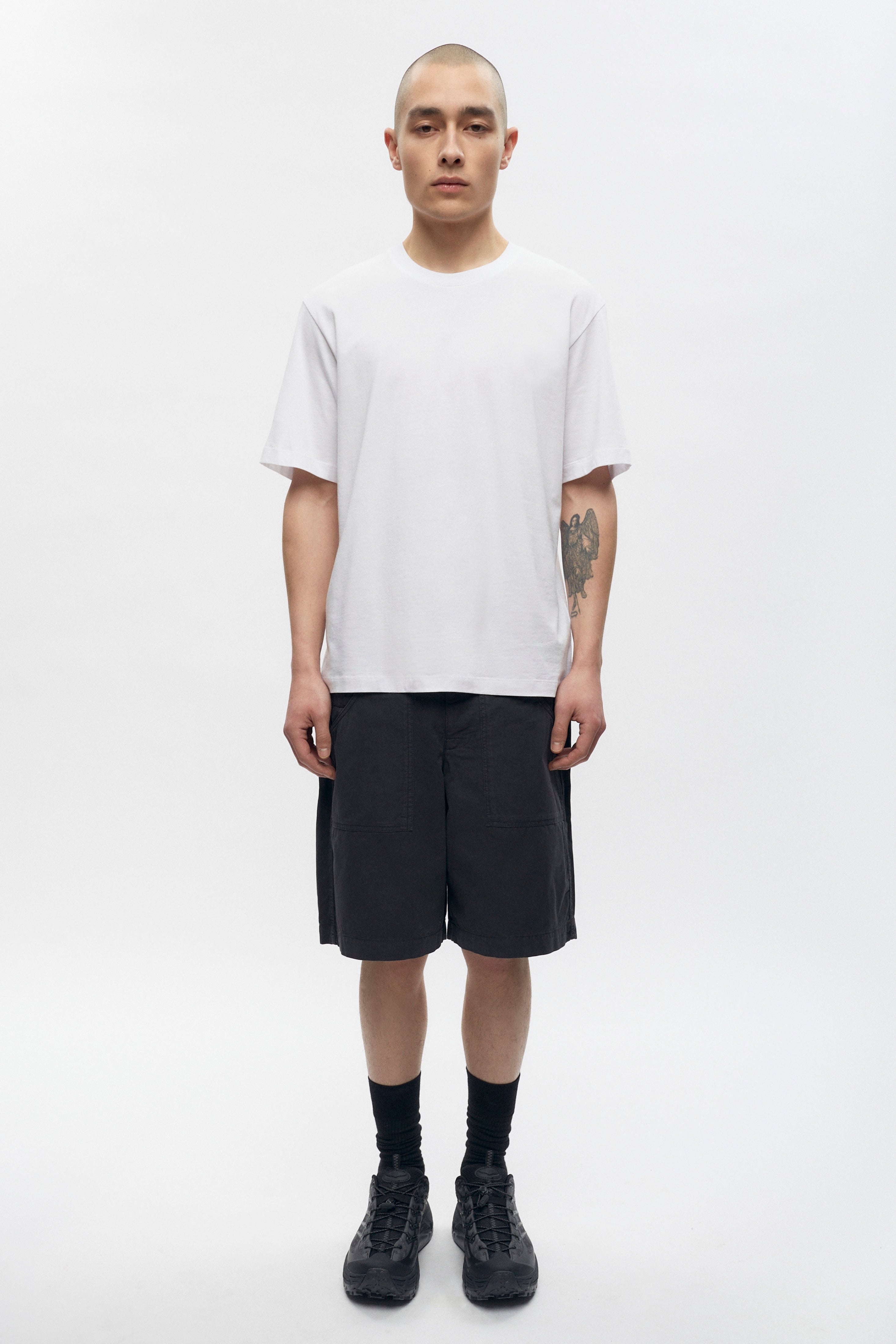 Raphael is 6ft is a regular M, and is wearing an M.