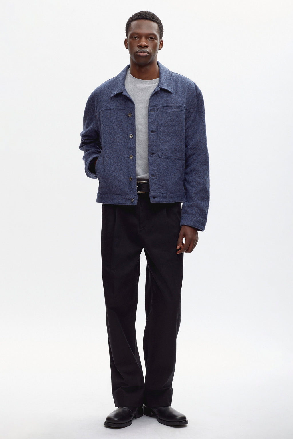 Rukundo is 6'1, is a regular L and is wearing an L.