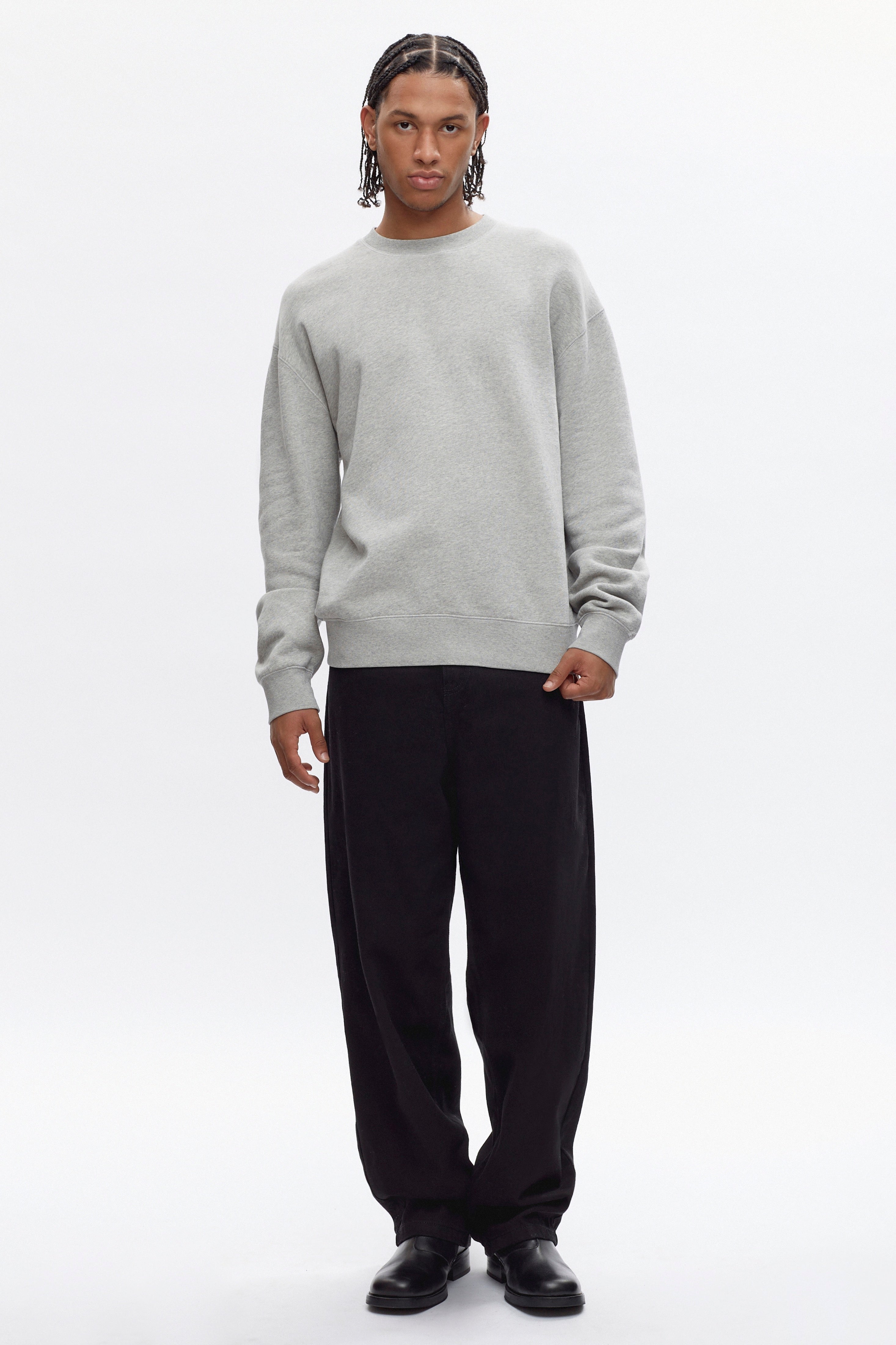 Ethan is 6ft 3in, a regular size M and wearing an L.