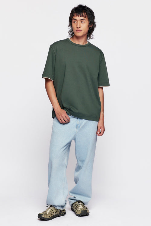 Tashi is 6'0, regular size M wearing a size M.