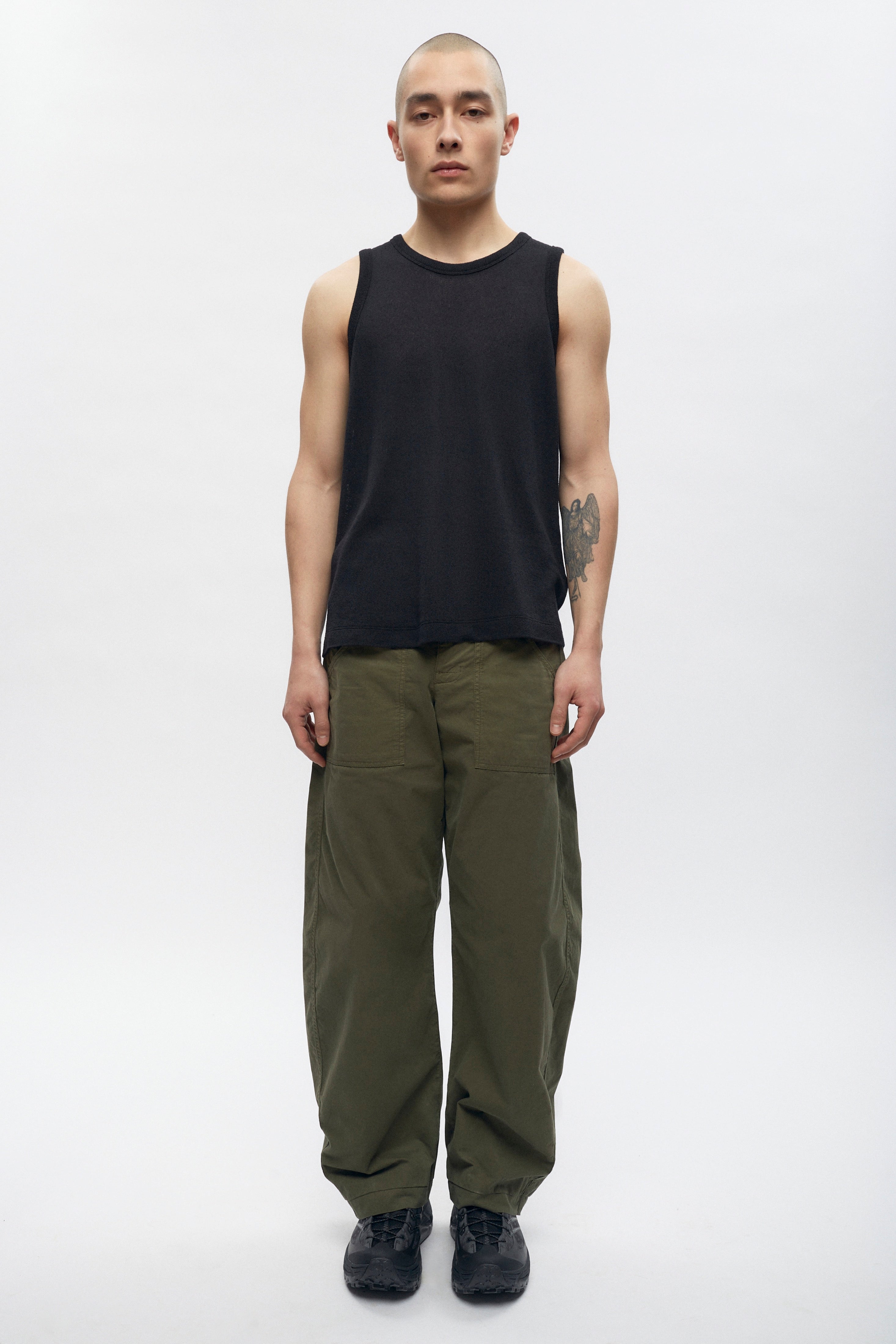 Raphael is 6ft is a regular M, and is wearing an M.