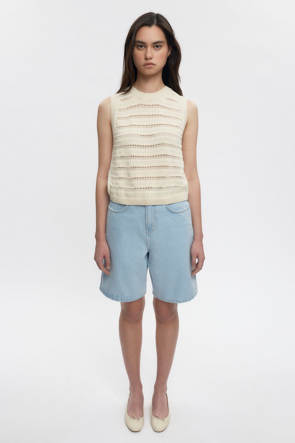 Michelle is 5’10” is a regular XS and is wearing a S.