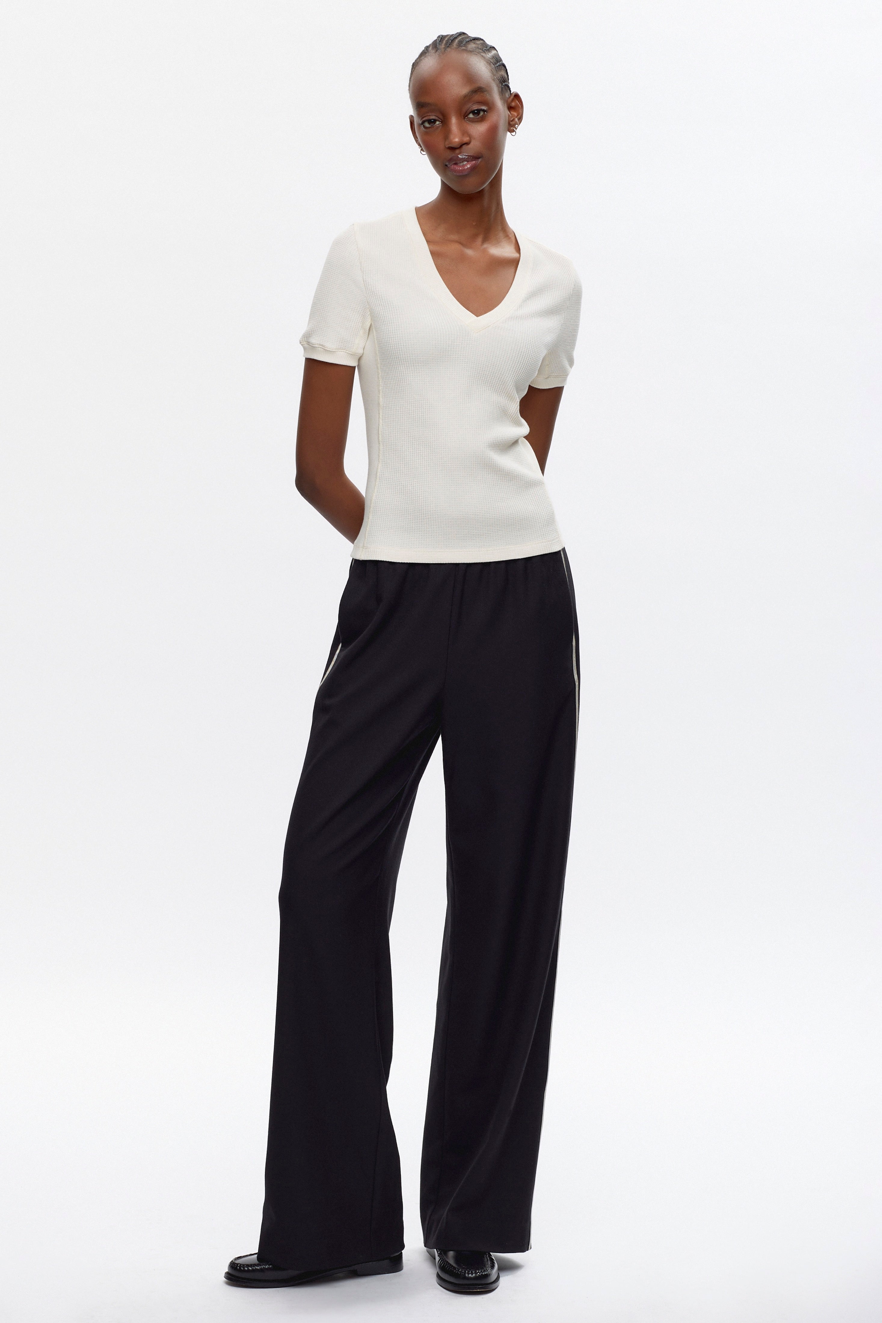 Rembo is 5ft 11in, a regular XS and wearing an XS.