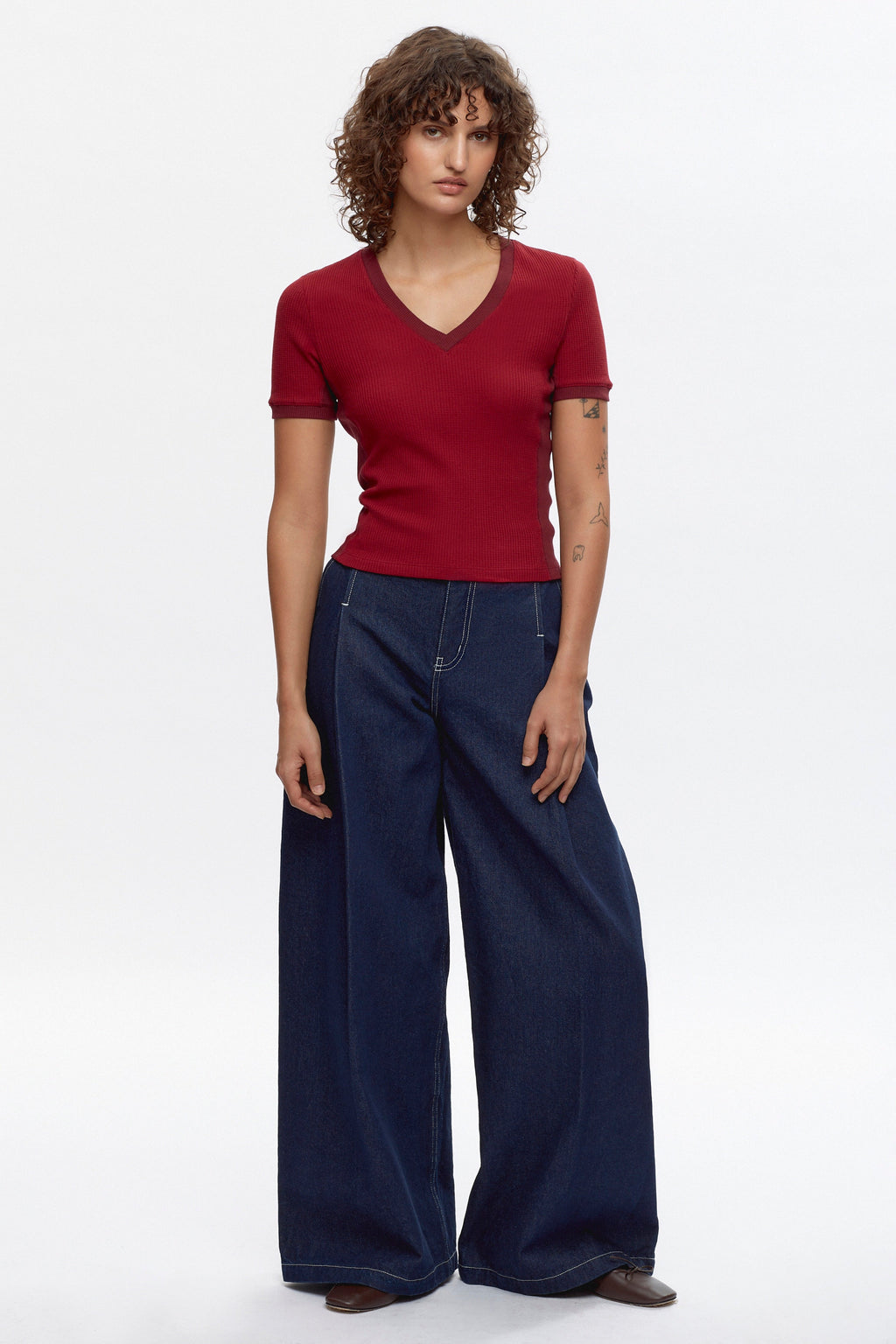 Francis is 5ft 9.5in, a regular size XS and wearing a XS.