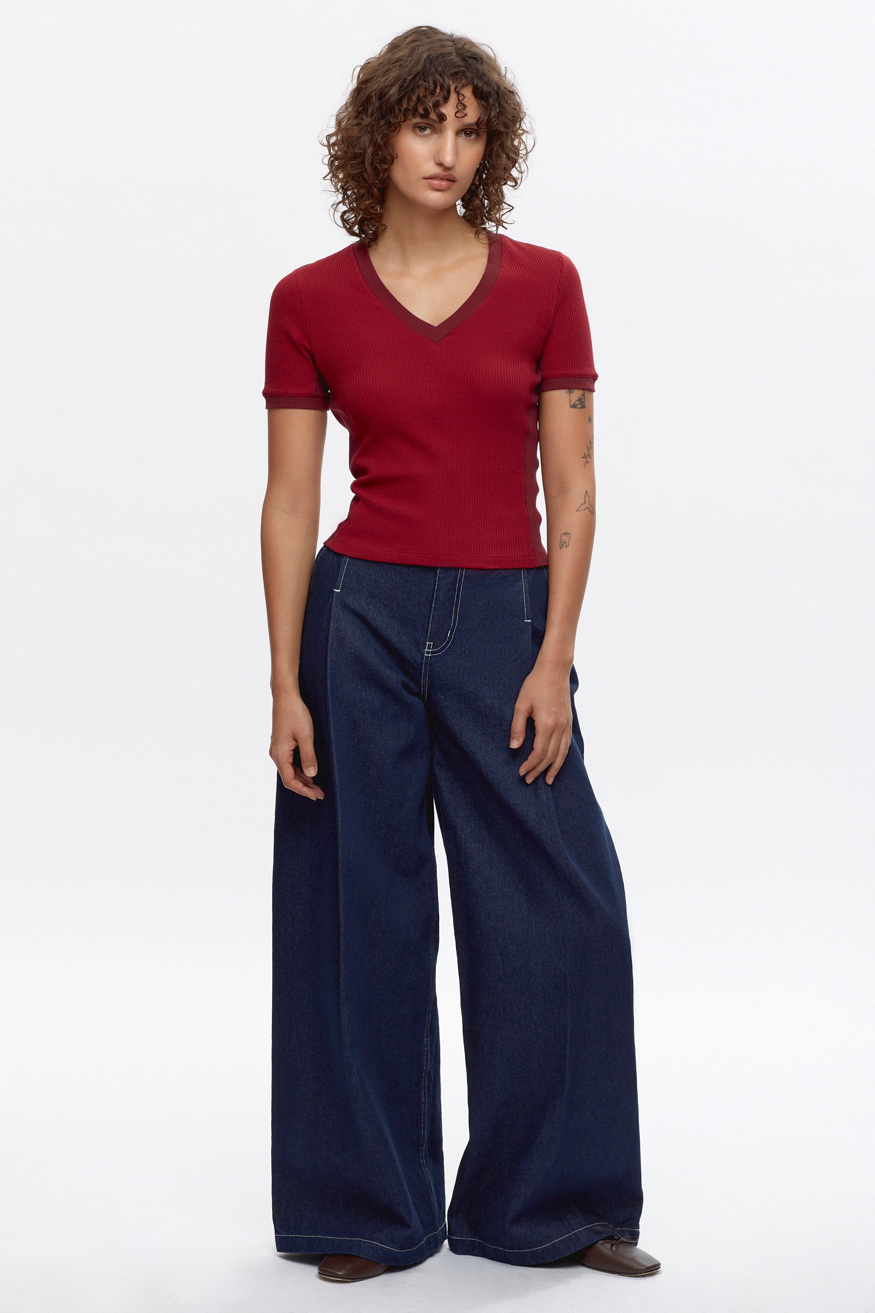 Francis is 5ft 9.5in, a regular size XS and wearing a XS.