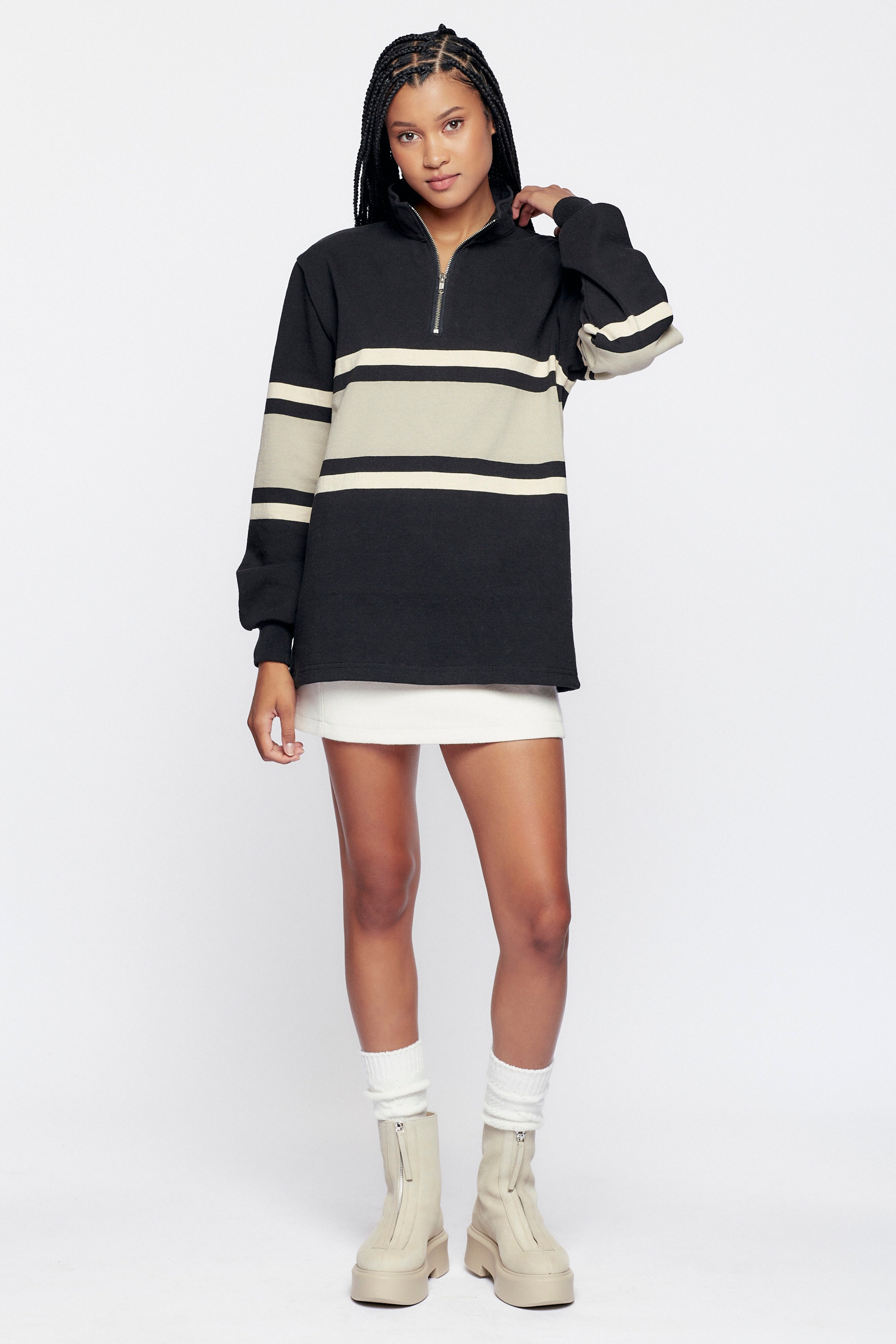 Inari is 5ft 10in, a regular size XS, and wearing size XS.