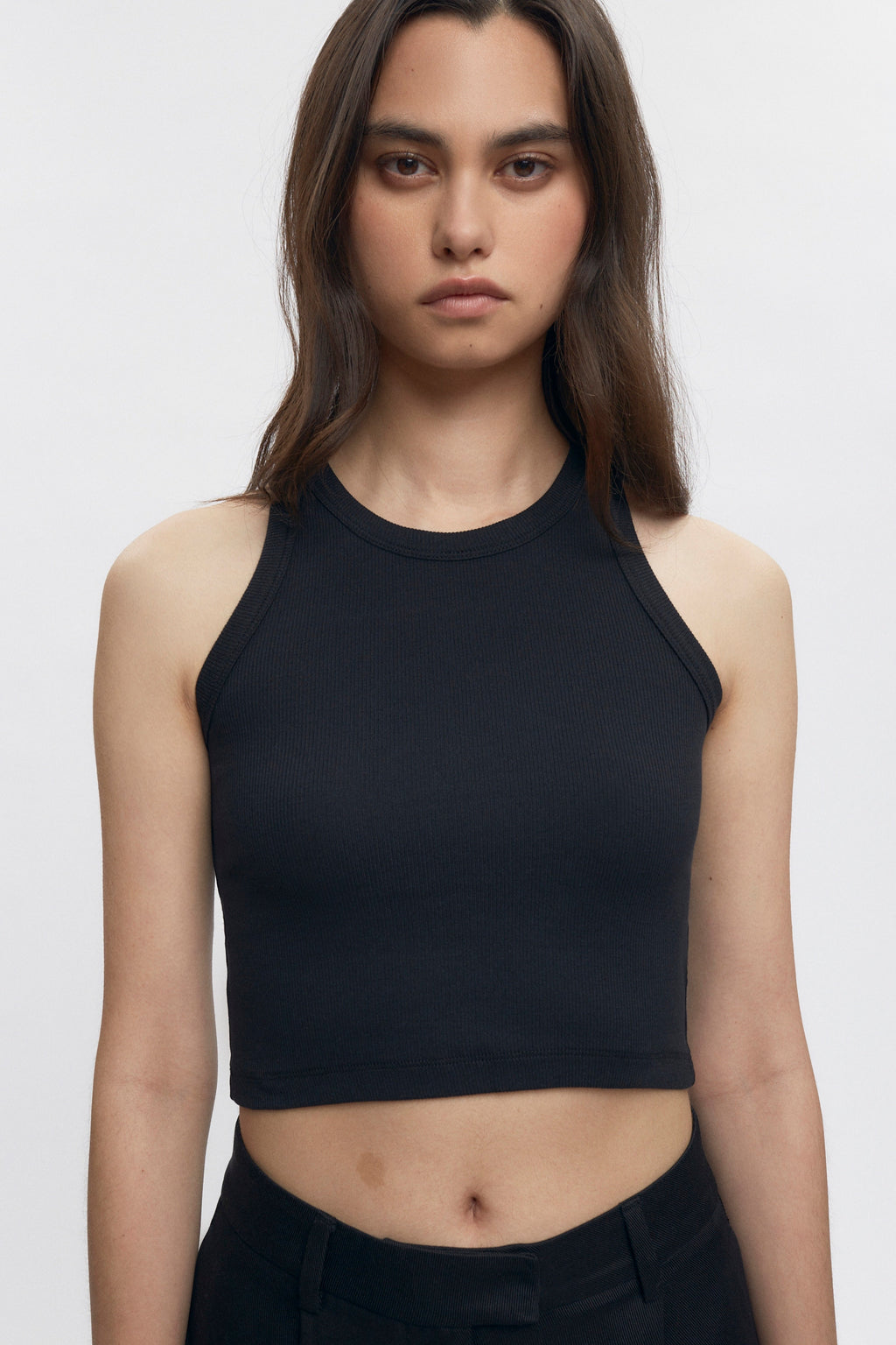 Michelle is 5’10” is a regular XS and is wearing a S.