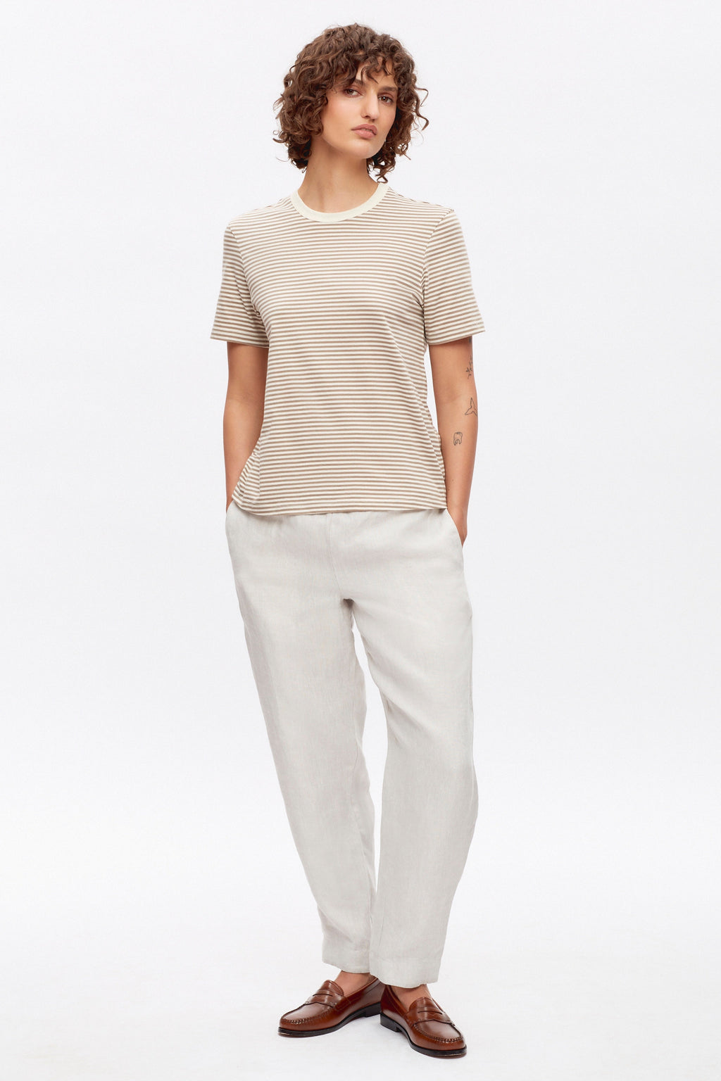 Francis is 5ft 9.5in, a regular size XS and wearing a S.