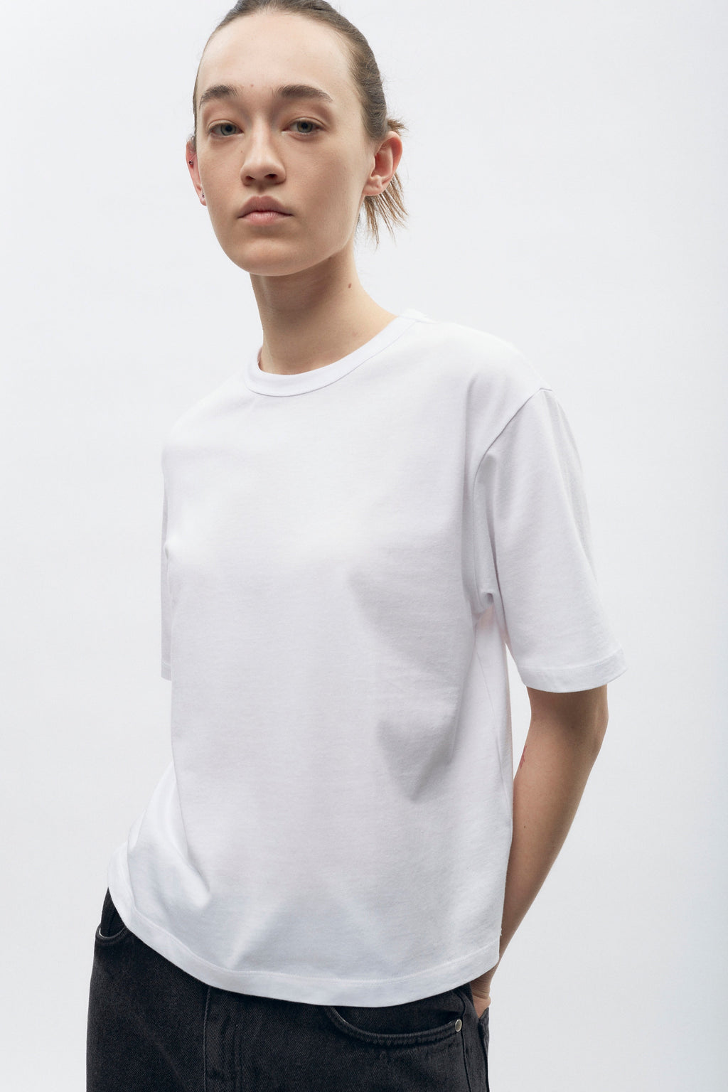 Elizabeth is 5’11" is a regular XS and is wearing an S.