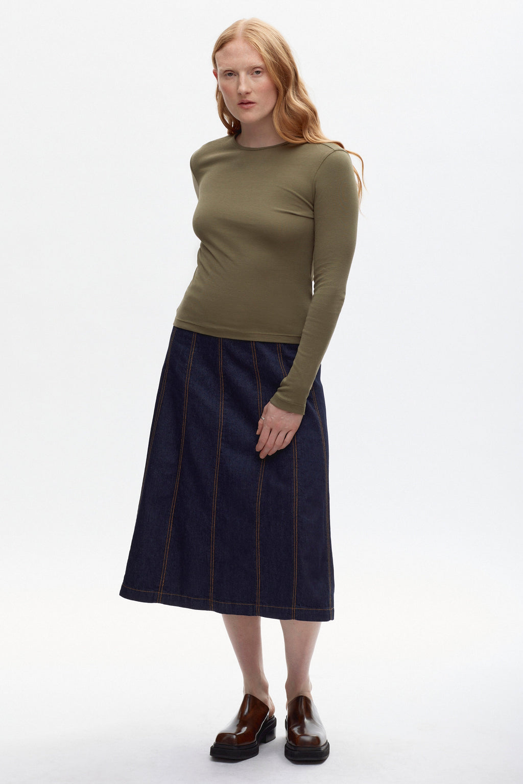 Kyla is 5'7.5, is a regular S and is wearing a S.