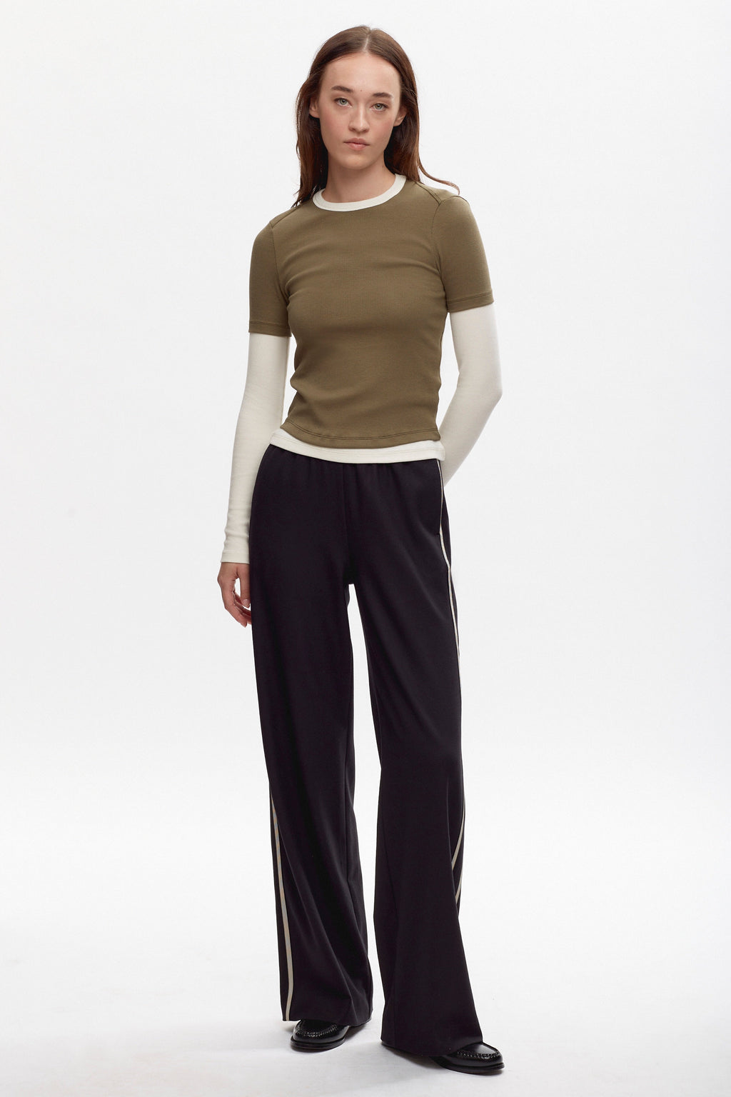 Elizabeth is 5'11" is a regular XS, and is wearing an XS.