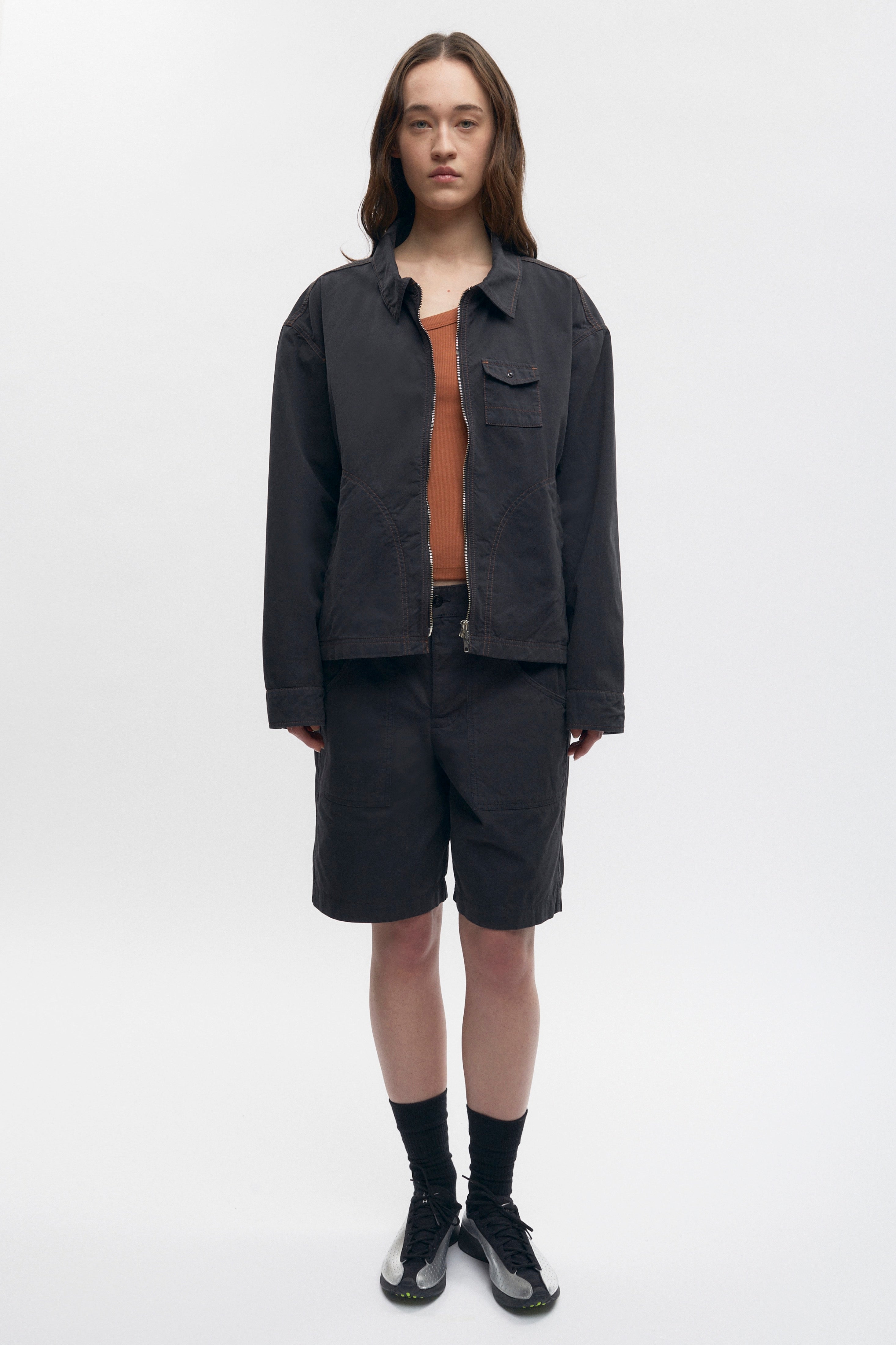 Elizabeth is 5’11" is a regular XS and is wearing an XS.