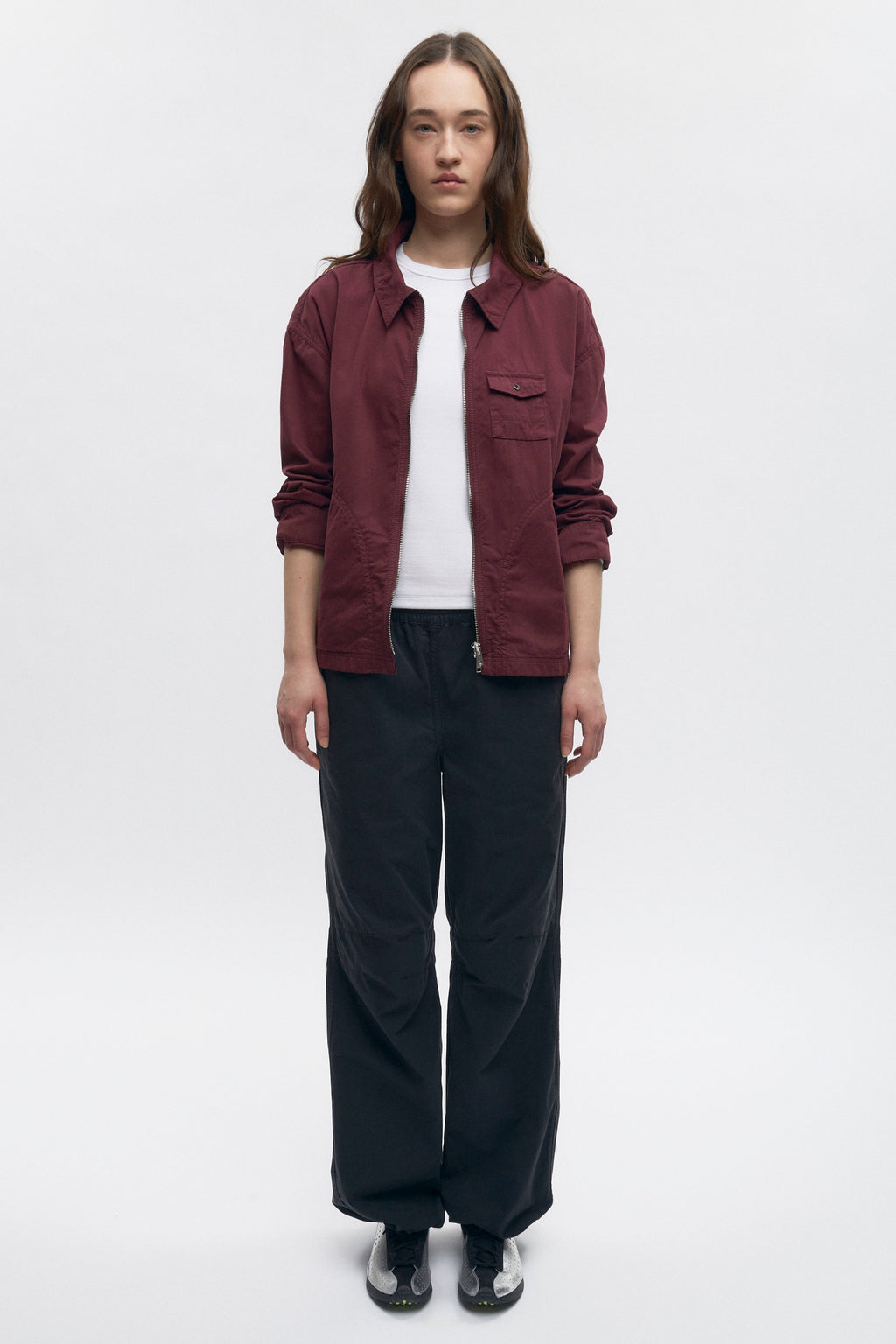 Elizabeth is 5’11" is a regular XS and is wearing a S.